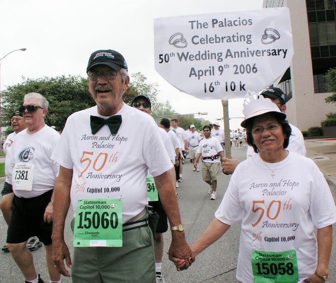 Aaron and Hope Palacios celebrate their 50th Anniversary with an annual walk in the 2006 Cap10K. [Jay Godwin/American-Statesman]