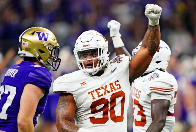 Texas Longhorns defensive lineman Byron Murphy II (90) celebrates after a play during the second quarter of the 2024 Sugar Bowl.